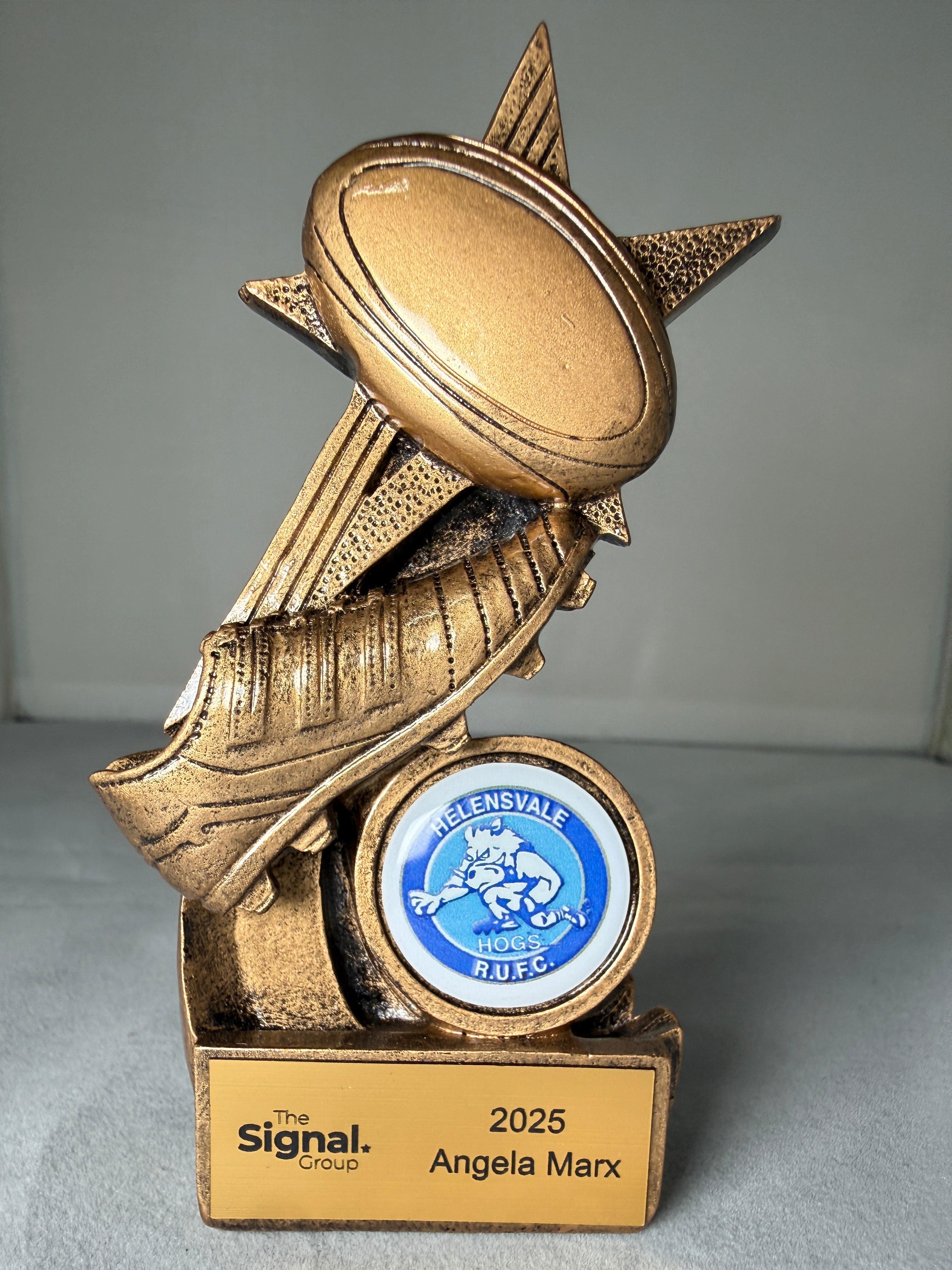 Rugby Ball and boot on star