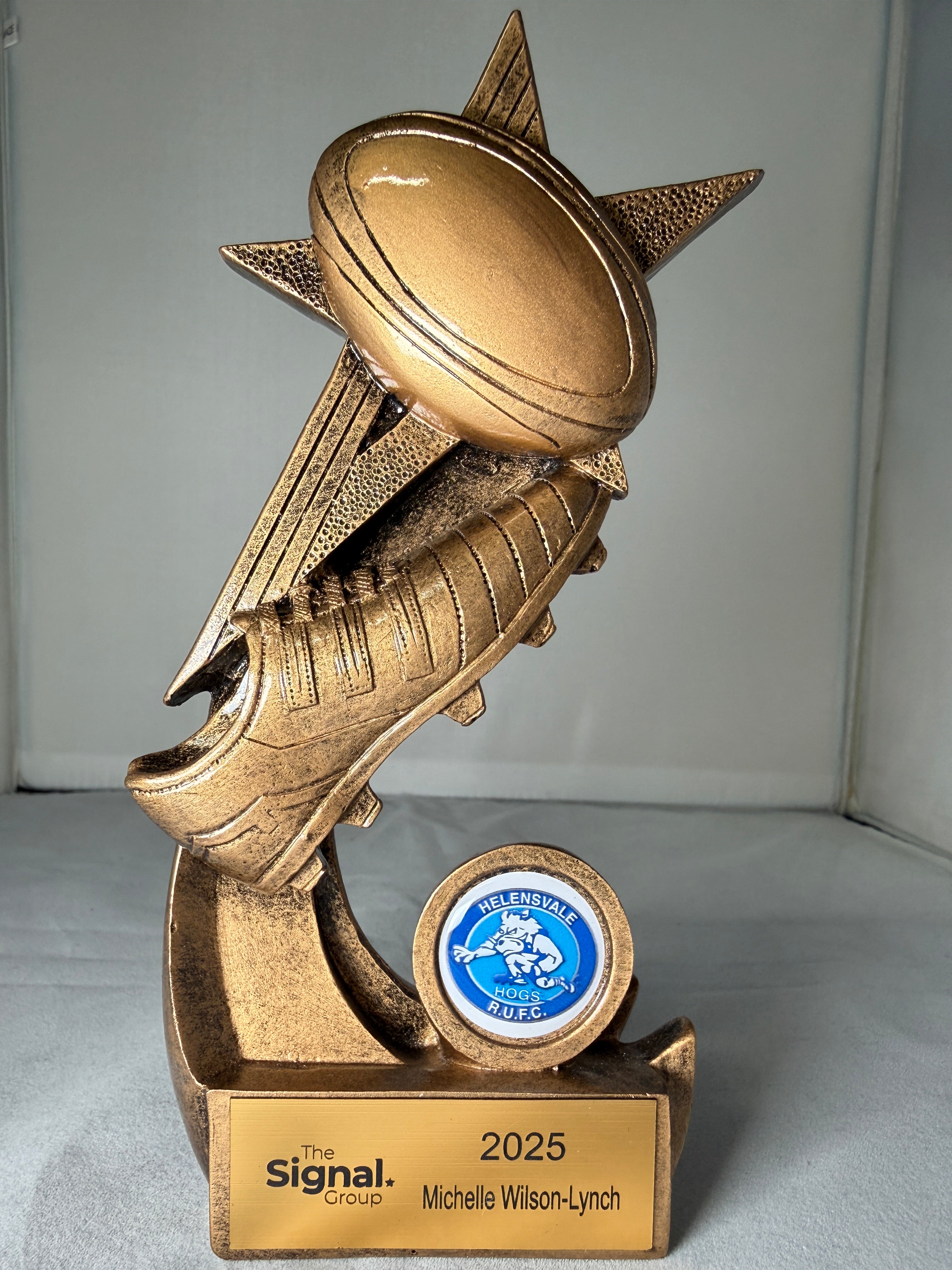 Rugby Ball and boot on star