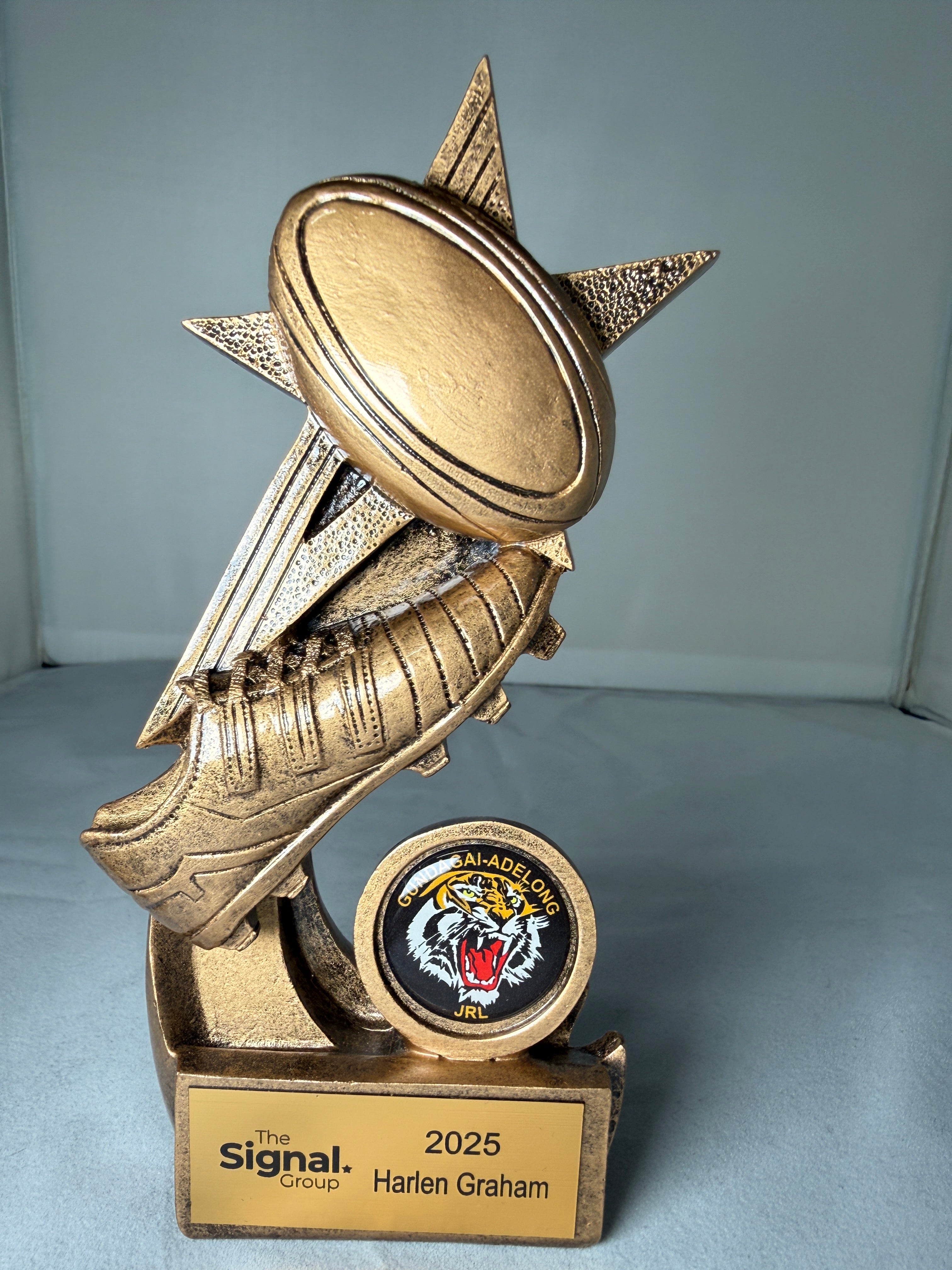 Rugby Ball and boot on star